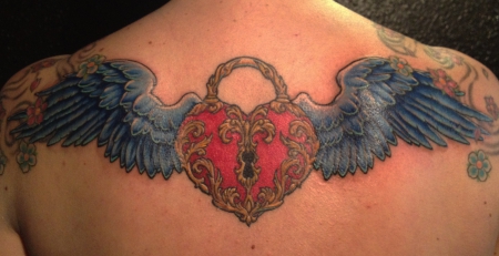 schloss-Tattoo: winged heart