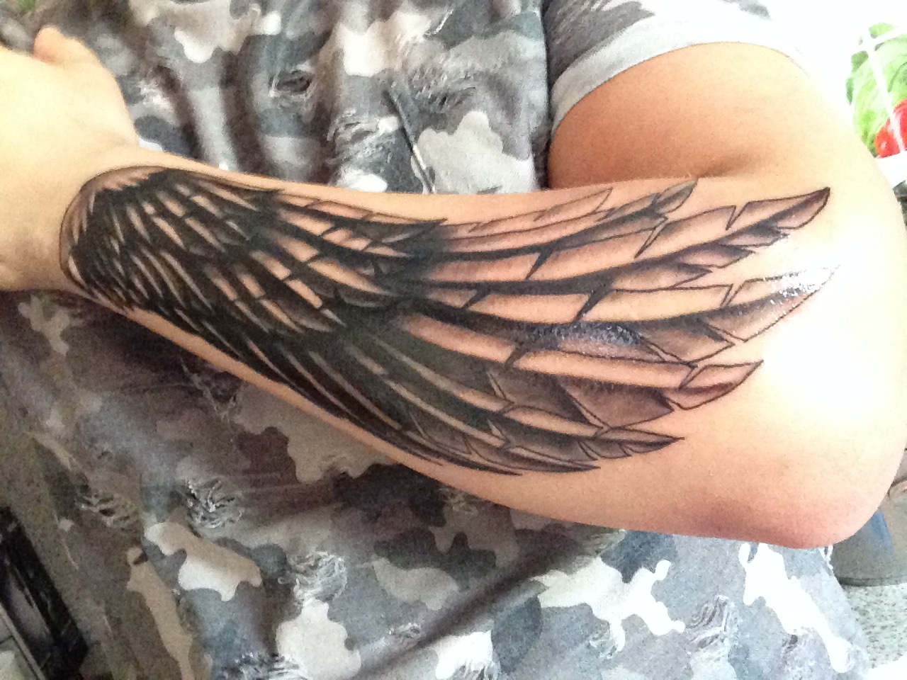 Tattoos Flugel Unterarm