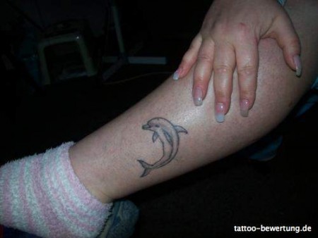 Sybille: Tattoos » Schwarz-Weiß Tiere Unterschenkel