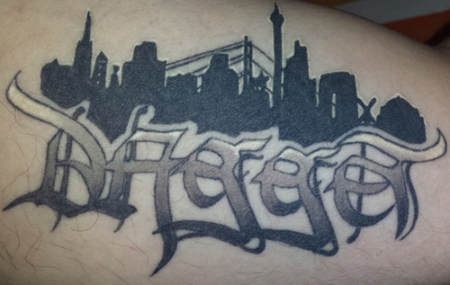 Text Tattoo Oberarm (Jan Van Dijk)