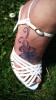Blume mit Schnörkeln am Fuss  (Erstes Tattoo)