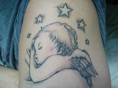 Baby engel motive tattoo