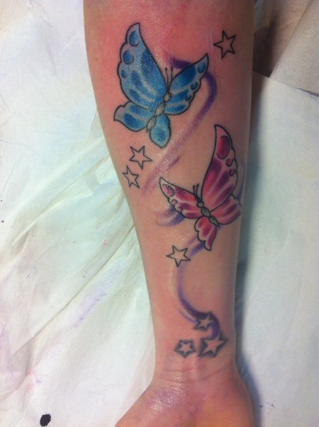 Schmetterlinge blumen sterne tattoo motive Tattoo Bilder