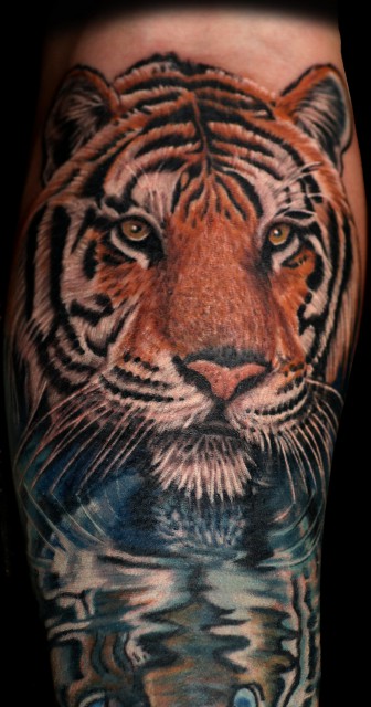 Frau mit tigerkopf tattoo bedeutung