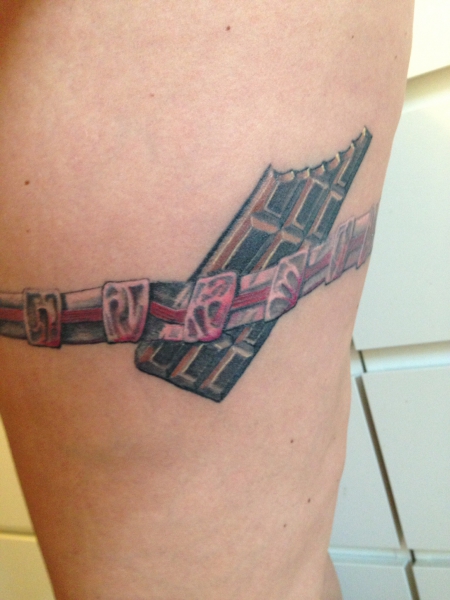 strumpfband-Tattoo: Schokoleidenschaft
