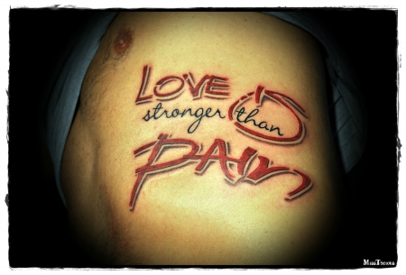 Lettering LOVE IS (stronger than) PAIN