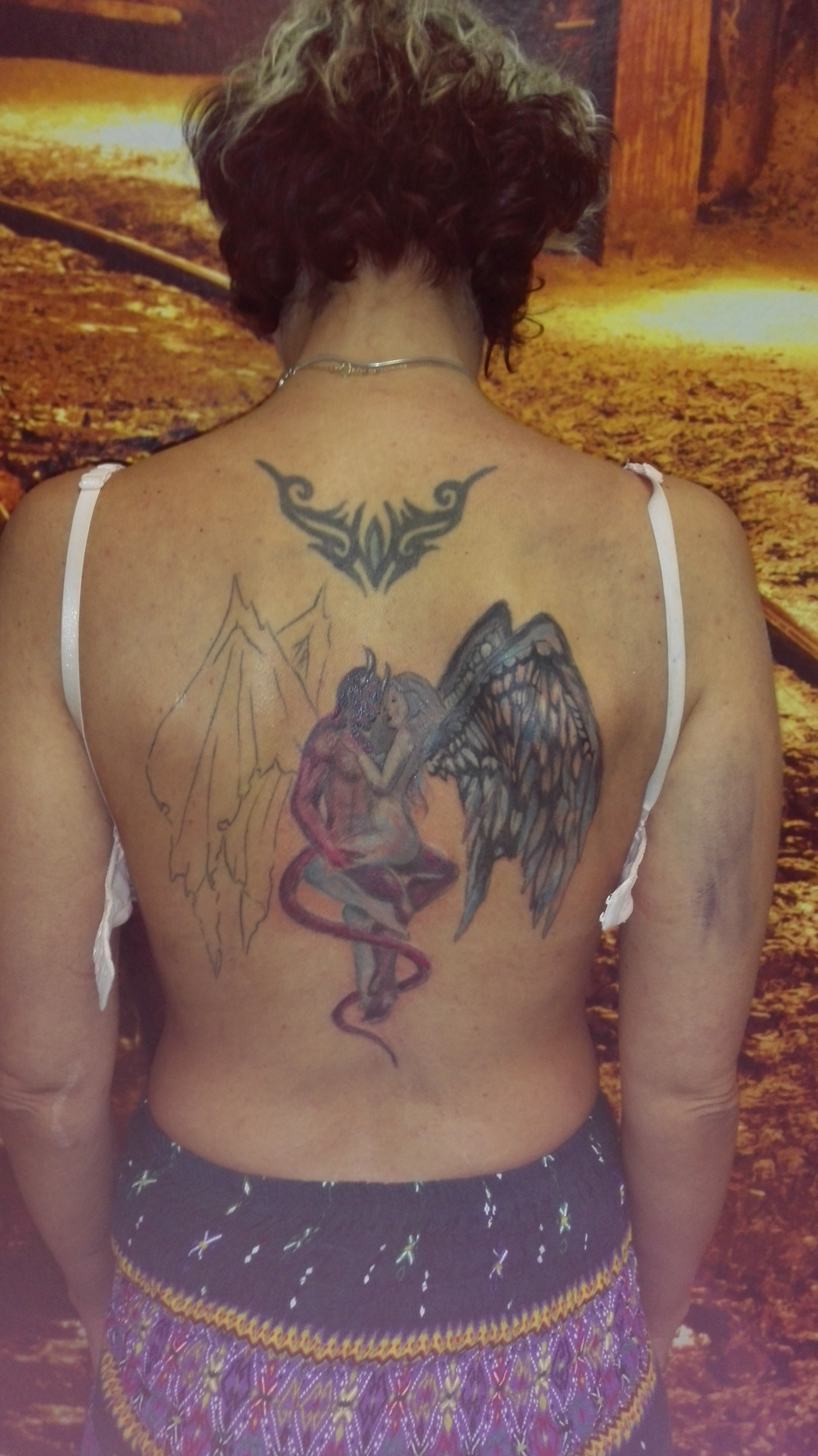 Tattoos rücken engel Tattoo am