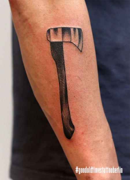 Blackwork axe tattoo