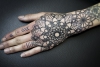 Geometric Dotwork Mandala Hand Tattoo