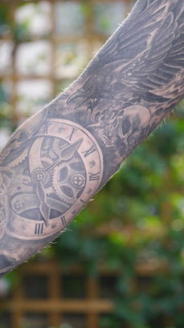 Fullsleeve mit klassischen Motiven Arm
