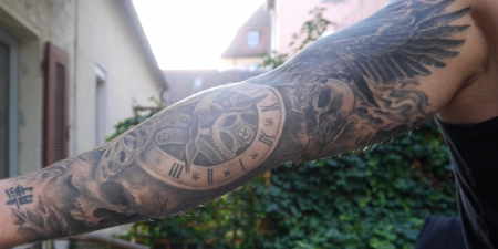 Fullsleeve mit klassischen Motiven Arm