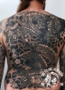 traditional dragon backpiece tattoo