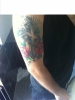 Erstes Tattoo, Kreuz mit Rosen