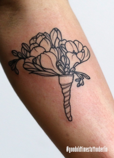 Blackwork bouquet tattoo