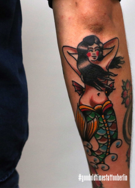 Traditional mermaid tattoo