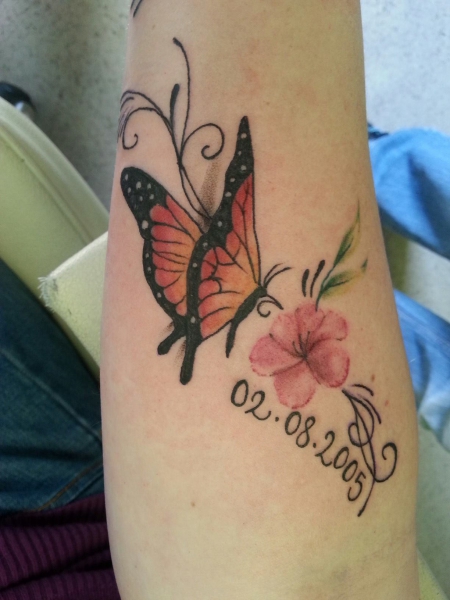 small butterfly, with flower and a little script