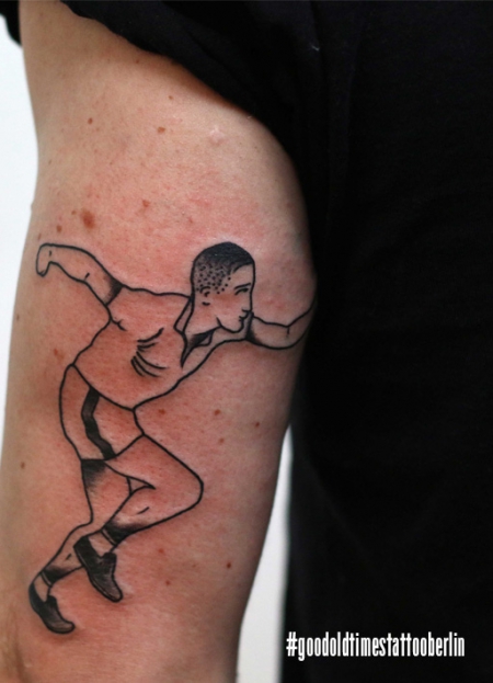 Blackwork runner tattoo