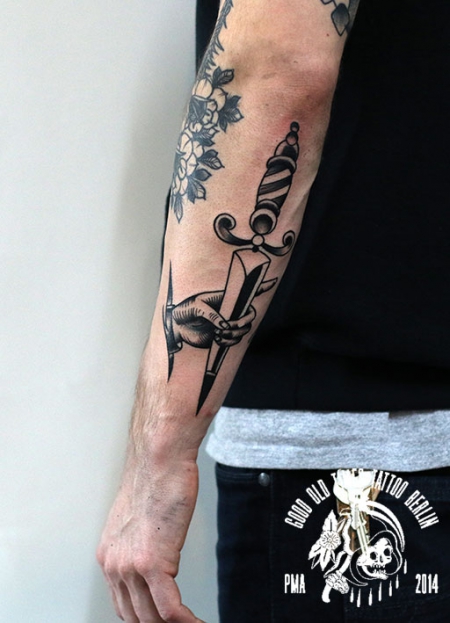blackwork dagger tattoo