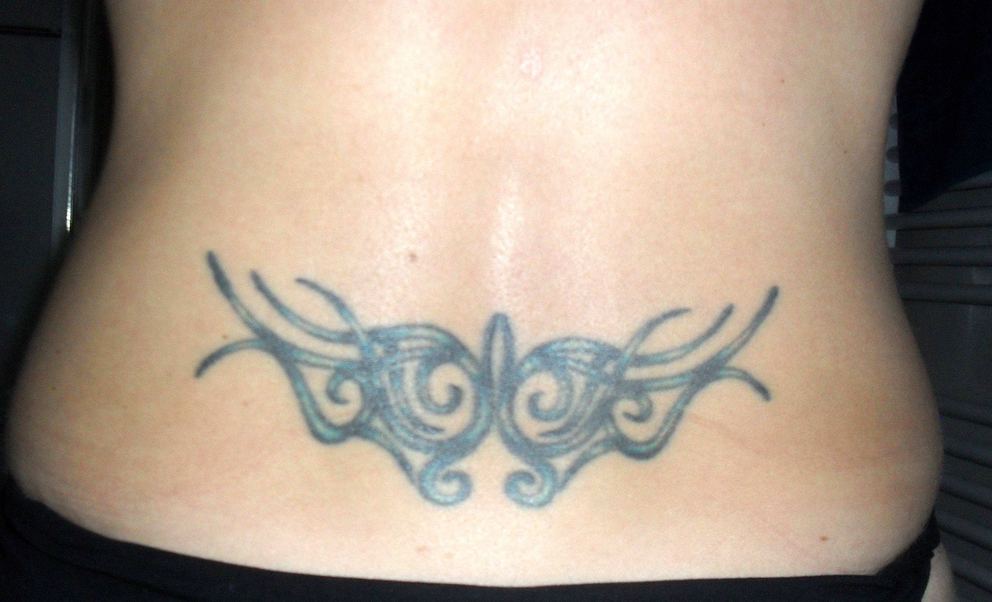 sabine78: Cover up bzw. Erweiterung meines Steißbeintattoos