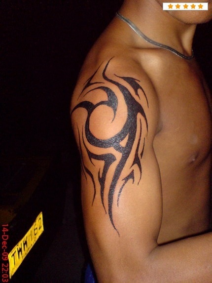 Andre75: Tribal als erstes Tattoo