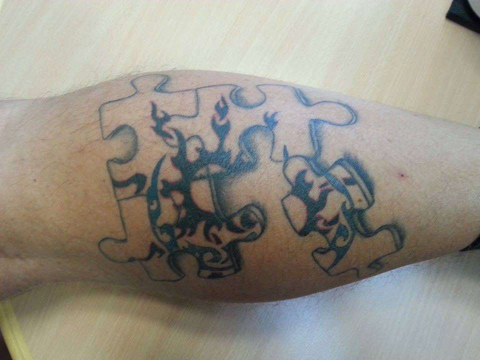 Puzzletattoo mit Farbe ausfüllen? TattooBewertung.de